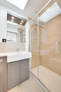 a bathroom with a sink and a shower at 2 Bed in Polruan oc-p00896 in Polruan