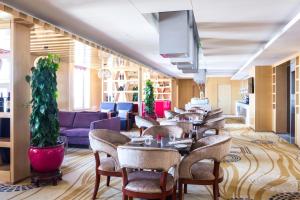 Posezení v ubytování Novotel Daqing Haofang