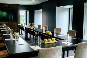 a conference room with a long table with chairs at The Study at Johns Hopkins in Baltimore