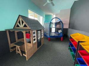 a room with a play room with a play house at New 2 bedroom rooftop condo in Nuevo Vallarta