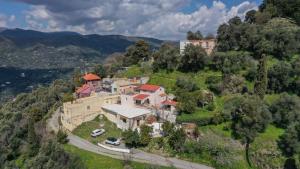 an aerial view of a house on a hill at Villa Koomas-Mountain View - kakodiki Paleochora in Avdhoulianá