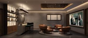a restaurant with a table and chairs in a room at Huashan Sanwanduo hotel 华山三万多酒店 in Huayin