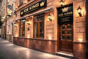 a ice king store on a street at night at ICE KING Apartament in Sandomierz