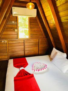a room with a bed in a small room at Gimanhala Thisawewa in Anuradhapura +58 photos