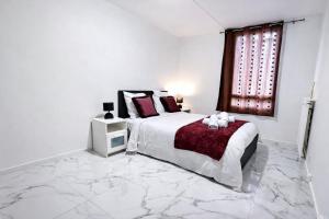 a white bedroom with a bed and a marble floor at Paris & Disney - 5 mins from Train Station - Champs Harmony in Champs-sur-Marne