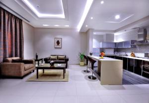 Η κουζίνα ή μικρή κουζίνα στο Auris Al Fanar Suites