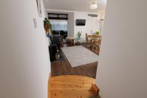 a view of a living room with a dining room at Bains Closs, Shetland Islands in Lerwick