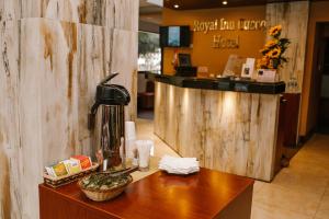 a coffee machine sitting on a table in a restaurant at Royal Inn Cusco Hotel in Cusco
