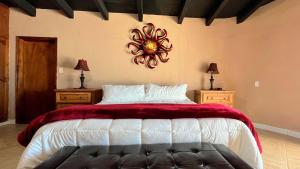 a bedroom with a large bed and two night stands at Recently Updated Beachfront Home Casa Neblina in Puerto Peñasco