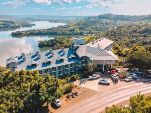 an aerial view of a building with a lake at Itá Thermas Resort e Spa in Itá