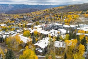 an aerial view of a resort in the mountains at Ski-In Ski-Out Resort Studio Steps from Slopes in Snowmass Village +10 photos