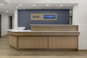 a lobby with a sign that says city express at City Express by Marriott Bemidji in Bemidji
