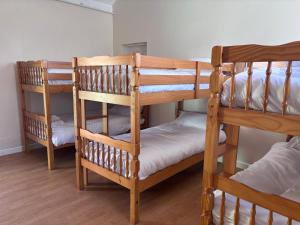 a couple of bunk beds in a room at Dover Priory Hotel in Dover