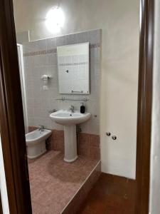 a bathroom with a sink and a mirror at Locanda Del Castello Bed an Breakfast in San Panfilo dʼOcre +78 photos