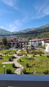 a view of a park with buildings in the background at ANASA in Stavros