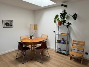a dining room with a table and chairs at Zum alten Pasewalker Kaufmann in Pasewalk