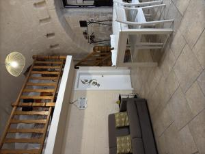 a room with two sets of bunk beds in it at More Apartments il castello in Bari