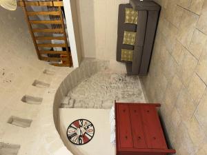 an overhead view of a clock on a wall at More Apartments il castello in Bari