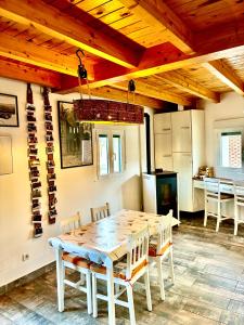 a dining room with a table and chairs at La Lechería de Daniela in Granja de Moreruela