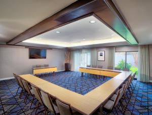 a conference room with a long table and chairs at Courtyard by Marriott Columbia Northeast/Fort Jackson Area in Killian +49 photos