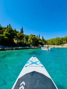 a view from the back of a boat in the water at Villa Silent Bay Lučice in Milna