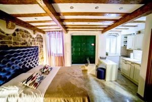 a bedroom with a large bed with skis on it at Apartment Genius Loci in Split