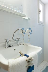 Koupelna v ubytování Aglaia Apartments