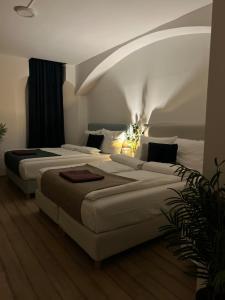 a bedroom with two beds in a room at Golden Residence in Vienna +28 photos