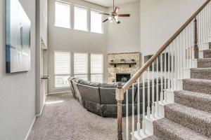 a living room with a couch and a fireplace at Dei Puer in Glenn Heights
