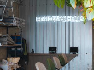 a reference hotel sign on the wall of a store at メーアレジデンスホテル 宮古空港前 - Meer Residence Hotel Miyako Airport - in Miyako-jima +31 photos
