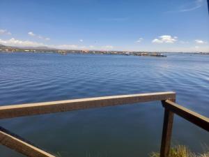 a view of a large body of water at Suma Kusi en el Titicaca in Puno
