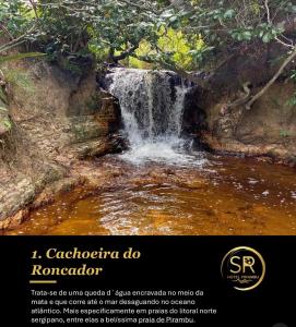 a flyer with a picture of a waterfall at SR Hotel e Pousada Pirambu in Pirambu