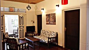 TV a/nebo společenská místnost v ubytování Cozy Cottage-Tangalle