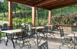 a group of tables and chairs on a patio at Az Ag Ricciarelli N in San Giuliano di Puglia
