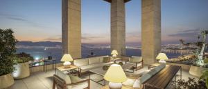 a rendering of a hotel patio with a view of the water at Grand Hyatt Izmir IstinyePark in İzmir