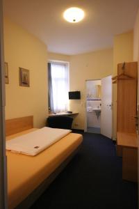 Kuchyň nebo kuchyňský kout v ubytování Altstadt Hotel + 37 fotografií