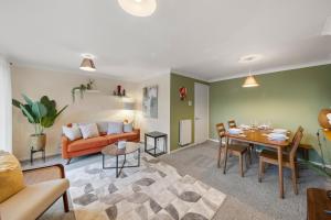 a living room with a couch and a table at Stylish 3Bed, in Hemel Hempstead by ARP Homes, Free Parking, Perfect for Contractors in Leverstock Green