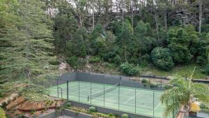 an aerial view of a tennis court in a garden at Grants - West Cambewarra, Longreach in West Cambewarra