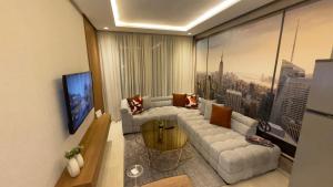 a living room with a couch and a table at CfC in Casablanca