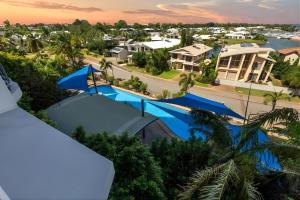 an aerial view of a resort with a swimming pool at Sunset Stunner Marina Views in Larrakeyah