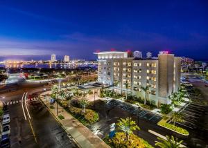 a view of a city at night with a building at Hyatt House San Juan in San Juan
