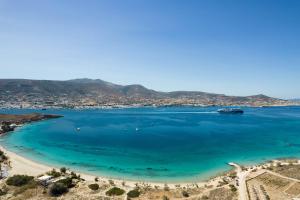 a view of a beach with a boat in the water at Villa Iliablue in Vrachonisída Petrokáravo +121 photos