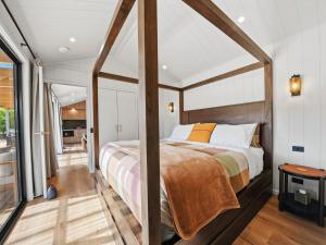 a bedroom with a bed in a room at Maydena Alpine Retreat in Maydena