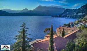 a view of a lake with mountains in the background at Mary house lake view in Varenna