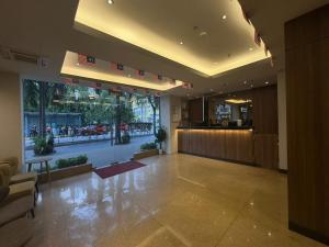 a lobby of a building with a bar in it at My Hotel @ Sentral in Kuala Lumpur