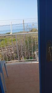 a view of the ocean from a balcony at B&B Vista Mare in Belvedere Marittimo