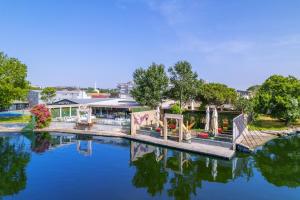 a bridge over a river with a building in the background at La Pearl Konaklama in Istanbul
