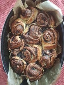 a bunch of pastries in a pan on a table at Casa Bunicii in Podu Dîmboviţei