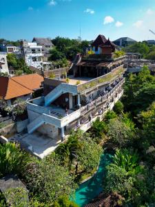 an overhead view of a building with a river at Karma Backpacker in Uluwatu