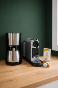 a coffee maker sitting on top of a counter at Backhaus 4 in Staberdorf